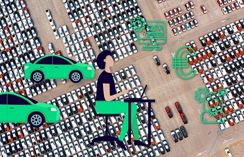Photo d'une flotte automobile avec l'illustration d'un gestionnaire de flotte travaillant sur son ordinateur pour piloter le parc