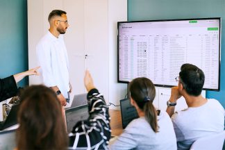 Equipe Winflotte Support et Gestionnaire en réunion de travail